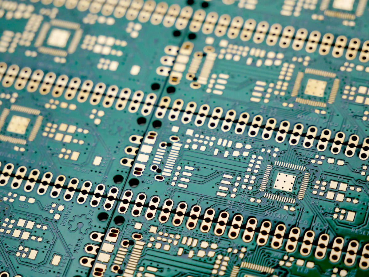 Close-up of a printed circuit board prototype with surface-mount pads